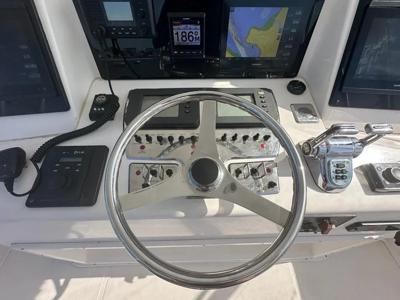 Slide: The Image of Cabo 35 Flybridge 2005 helm with navigation equipment. - 8