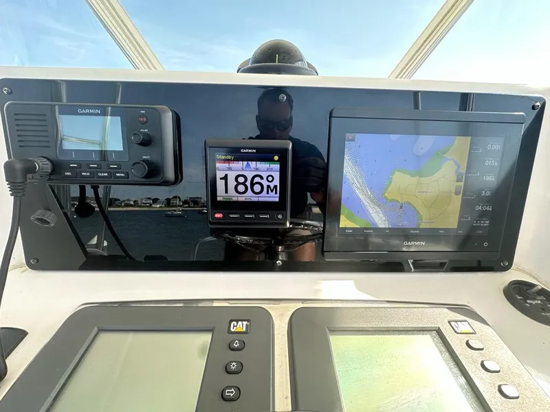 Slide: The Image of Navigation systems on a 2005 Cabo 35 Flybridge boat. - 9