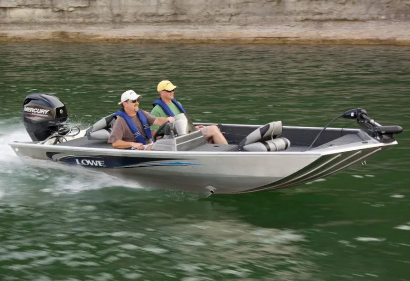 Slide: The Image of Manufacturer Provided Image: 2016 Lowe Stryker 16 boat cruising on a lake with two passengers. - 6