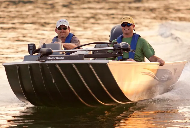 Slide: The Image of Manufacturer Provided Image: Two men boating in a 2016 Lowe Stryker 16 on a sunny day. - 8