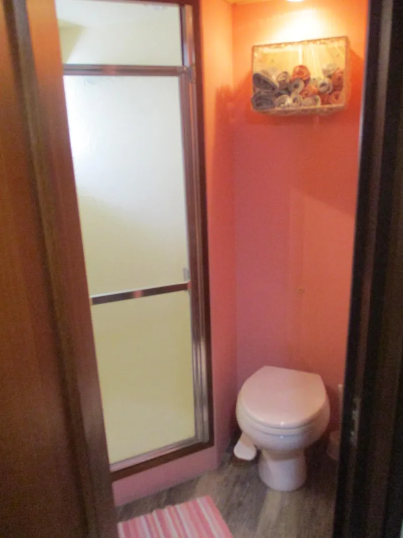 Slide: The Image of Bathroom in 1986 Hatteras 43 Double Cabin with shower and toilet. - 34