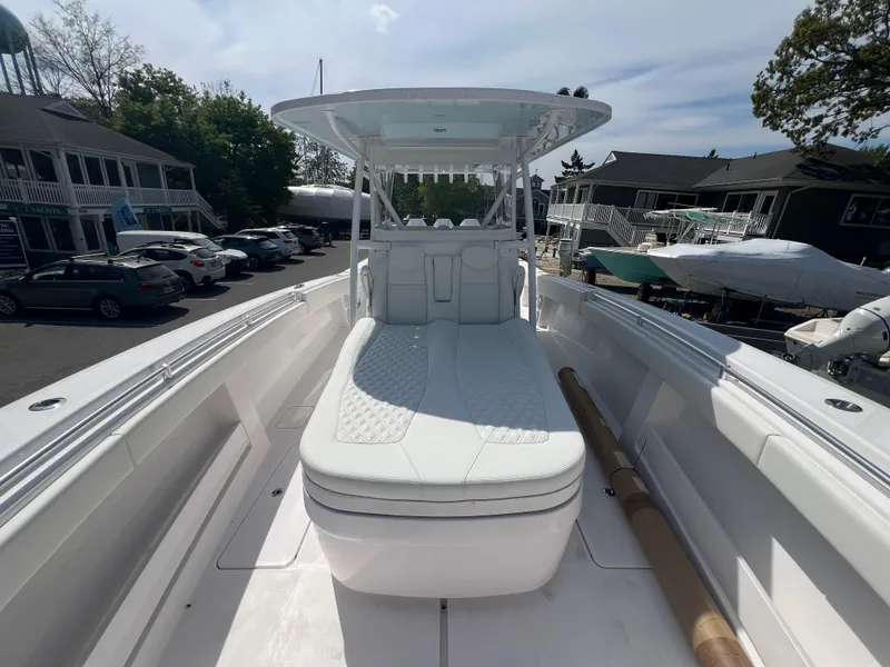 Slide: The Image of 2024 Invincible 39 Open Fisherman boat with white cushioned seating. - 6