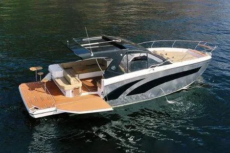 The Image of 2026 Hanover 415 Inboard boat on water, featuring sleek design and spacious deck. - 0