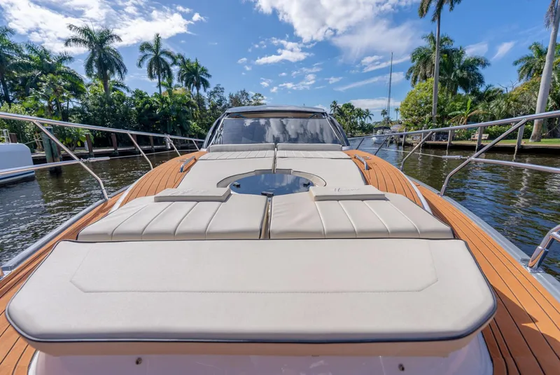 Slide: The Image of Luxurious Hanover 415 yacht deck with sun loungers, surrounded by tropical scenery, 2025 model. - 6