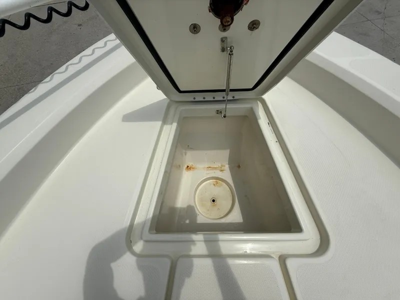 Slide: The Image of Open storage compartment on a 2012 Hydra-Sports 23 Bay Bolt boat. - 14