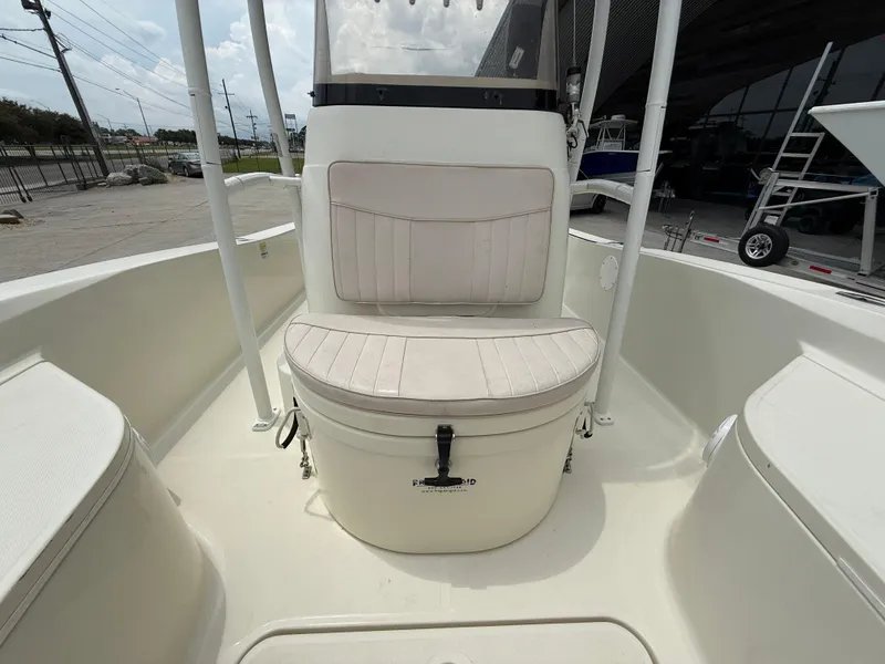 Slide: The Image of 2012 Hydra-Sports 23 Bay Bolt boat interior with cushioned seating and storage. - 15