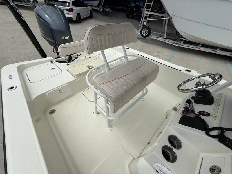 Slide: The Image of 2012 Hydra-Sports 23 Bay Bolt boat interior with steering wheel and seating. - 16