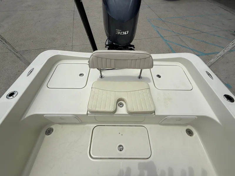 Slide: The Image of 2012 Hydra-Sports 23 Bay Bolt boat interior with seating and storage compartments. - 17