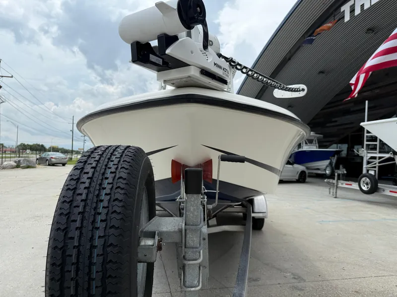 Slide: The Image of 2012 Hydra-Sports 23 Bay Bolt boat on trailer, parked outside a building. - 3