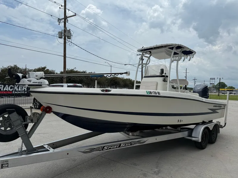 Slide: The Image of 2012 Hydra-Sports 23 Bay Bolt boat on trailer, parked outdoors under cloudy sky. - 4