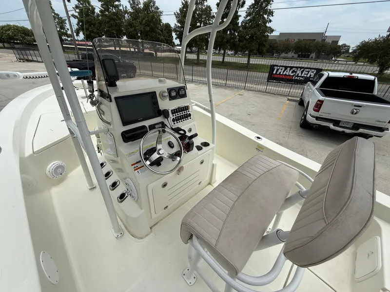 Slide: The Image of 2012 Hydra-Sports 23 Bay Bolt boat interior with steering console and seating. - 9