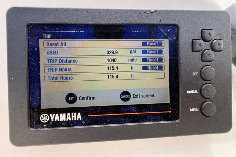 Slide: The Image of Yamaha display showing trip data: 329.9 gallons used, 1040 miles, 115.4 hours. - 8