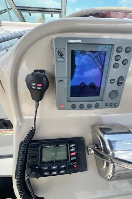 Slide: The Image of Control panel of 2003 Sea Ray 290 Amberjack with Raymarine navigation system. - 5