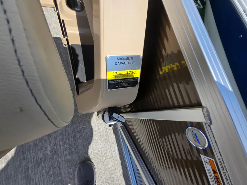 Slide: The Image of 2020 Avalon LSZ Cruise II boat capacity label, showing maximum capacity of 12 people or 1780 pounds. - 18