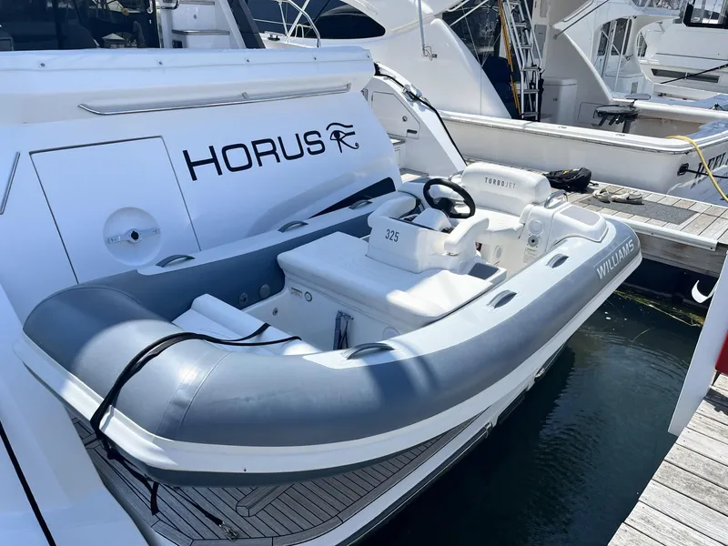 The Image of 2021 Williams Jet Tenders Turbojet 325 docked beside a yacht. - 0