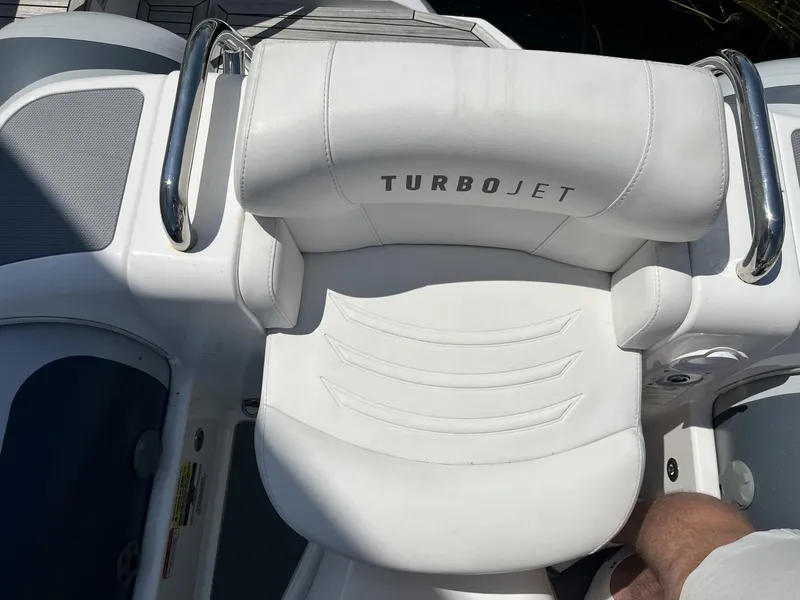 Slide: The Image of 2021 Williams Jet Tenders Turbojet 325, white seat with "Turbojet" branding, stainless steel handles. - 11