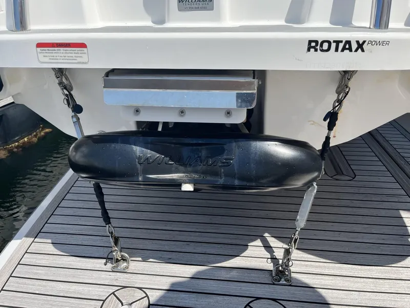 Slide: The Image of 2021 Williams Jet Tenders Turbojet 325 rear view with Rotax power engine. - 14