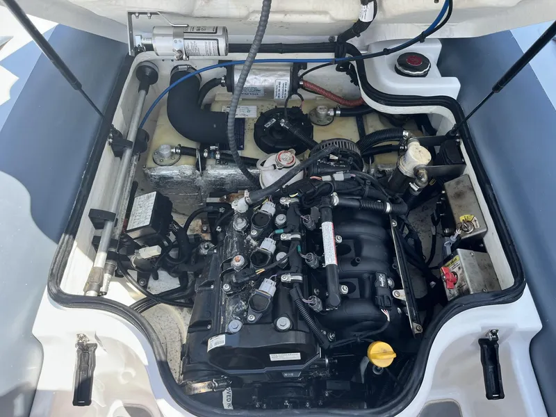 Slide: The Image of Engine compartment of a 2021 Williams Jet Tenders Turbojet 325, showcasing mechanical components. - 15