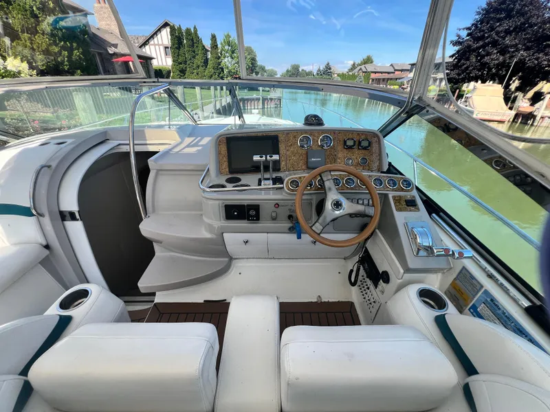 Slide: The Image of Cockpit Seating Area with wet bar, sink and ice maker - 11