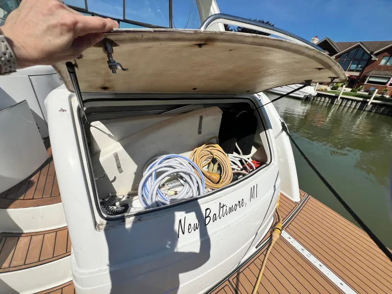 Slide: The Image of Mercury SmartCraft displays and Bennett trim tab gauges on 2006 Formula 40 PC dashboard. - 20