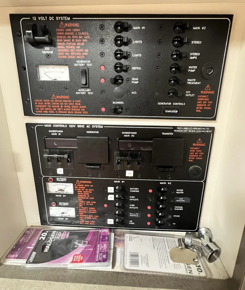 Slide: The Image of Control panel of a 2006 Formula 40 PC boat with various switches and a radio display. - 24