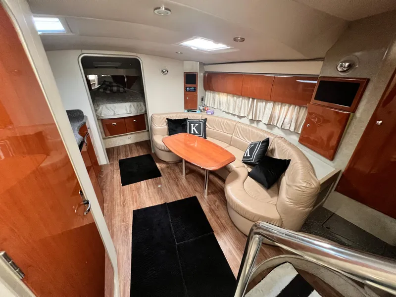 Slide: The Image of Luxurious interior of a 2006 Formula 40 PC yacht with modern amenities and elegant design. - 26