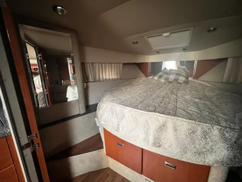 Slide: The Image of Interior cabin of a 2006 Formula 40 PC yacht with bed and TV. - 32