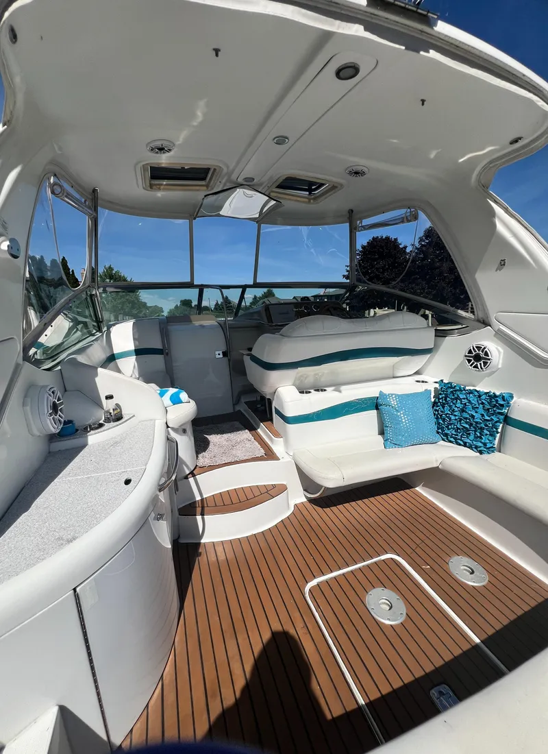 Slide: The Image of 2006 Formula 40 PC yacht docked at a marina on a sunny day. - 8