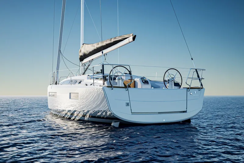Slide: The Image of 2026 Jeanneau Sun Odyssey 415 sailboat on calm ocean waters under clear sky. - 3