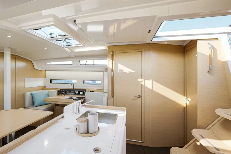 Slide: The Image of Interior of 2026 Jeanneau Sun Odyssey 415 yacht, featuring modern design and natural lighting. - 9