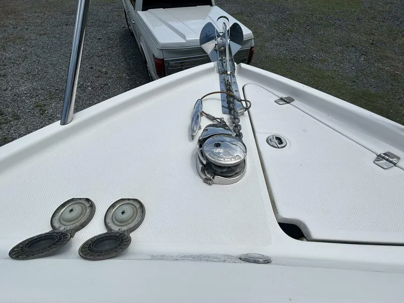 Slide: The Image of 2017 Regal 26 Express boat bow with anchor and winch system. - 35