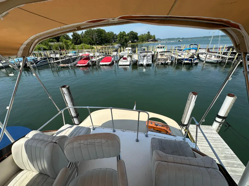 Slide: The Image of View from 1977 Egg Harbor 33 Sedan overlooking marina with boats docked. - 37