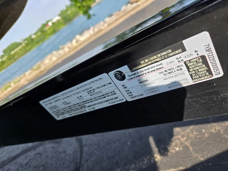 Slide: The Image of 2021 Crest Classic LX 220 SLC trailer label with tire and loading information. - 8