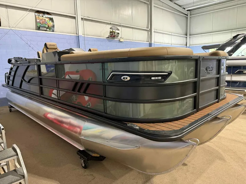 Slide: The Image of 2026 Bentley Pontoons Elite 223 Swingback Dual Captain Full Tube in showroom. - 2