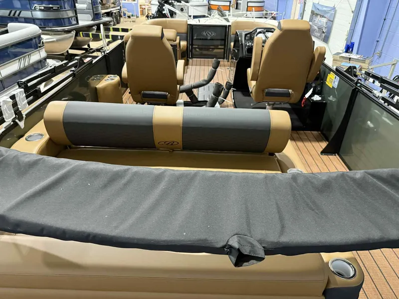 Slide: The Image of 2026 Bentley Pontoons Elite 223 interior with dual captain seats and swingback design. - 20