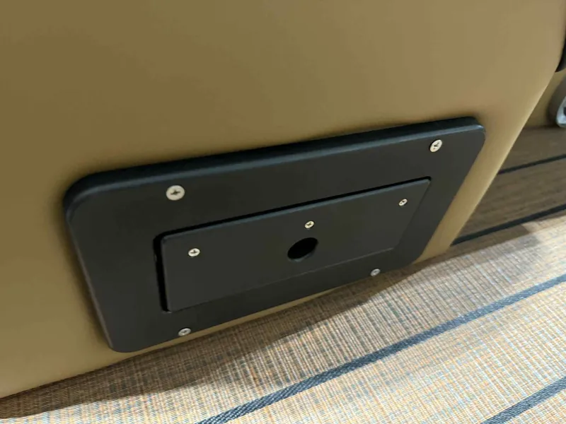 Slide: The Image of 2026 Bentley Pontoons Elite 223 Swingback detail, featuring a black panel on a wooden surface. - 7