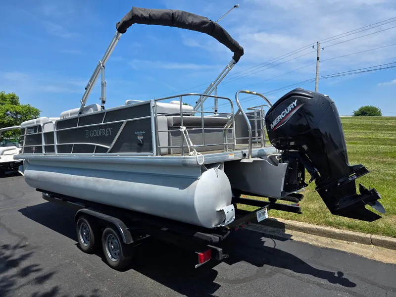 Slide: The Image of 2021 Godfrey SWEETWATER 2286 SFL pontoon boat with Mercury outboard motor on trailer. - 3