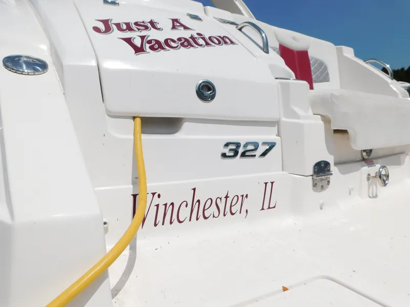 Slide: The Image of 2013 Chaparral 327 SSX boat with "Just A Vacation" text, Winchester, IL. - 10