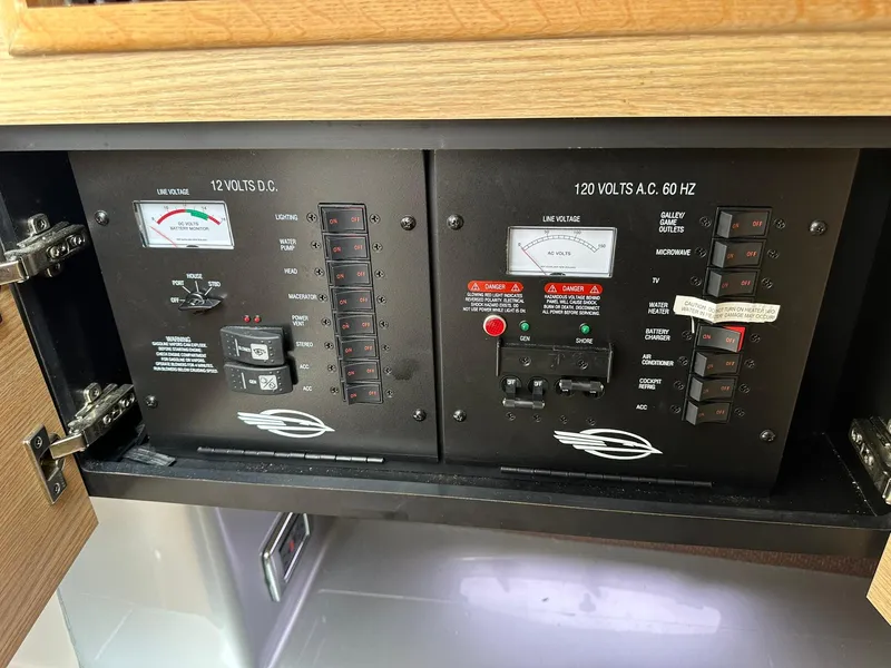 Slide: The Image of Electrical control panel on a 2013 Chaparral 327 SSX boat. - 26
