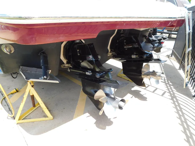 Slide: The Image of 2013 Chaparral 327 SSX boat with dual propellers and MerCruiser engines. - 6