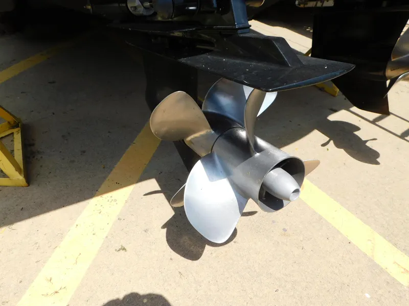 Slide: The Image of Propeller of a 2013 Chaparral 327 SSX boat on a concrete surface. - 7