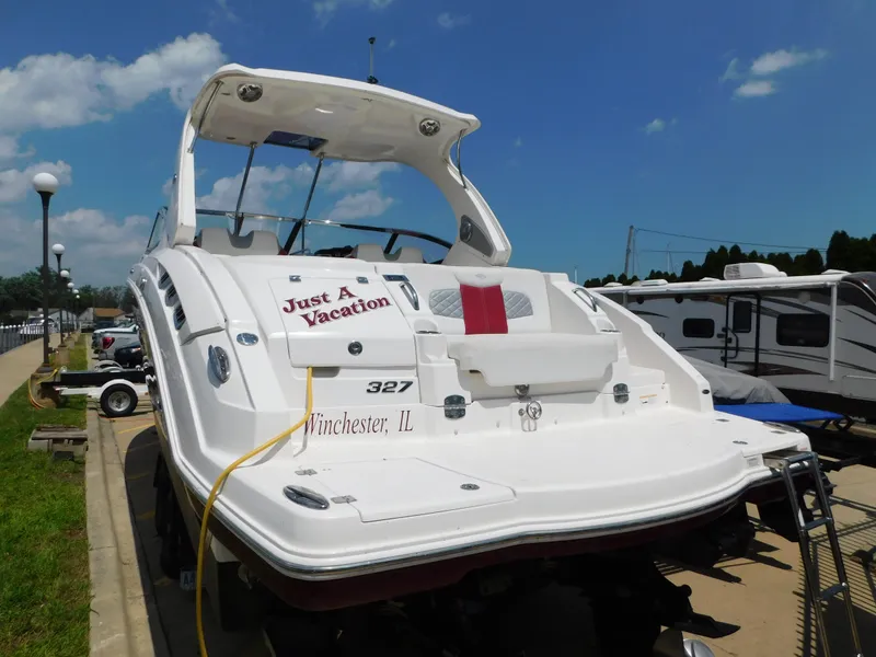 Slide: The Image of 2013 Chaparral 327 SSX boat named "Just A Vacation" docked in Winchester, IL. - 9