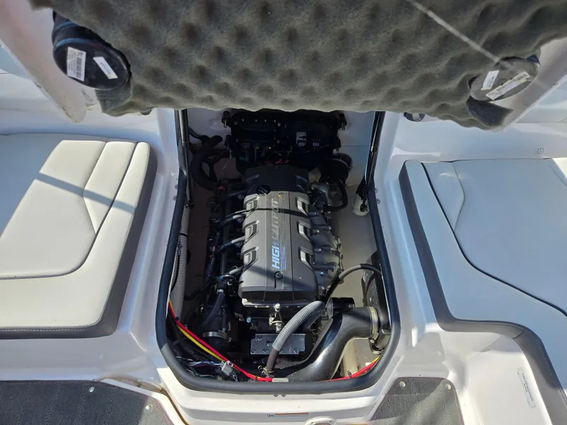 Slide: The Image of 2021 Yamaha Boats SX190 engine compartment with high output engine visible. - 22
