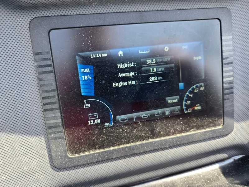 Slide: The Image of Dashboard display of a 2021 Yamaha SX190 boat showing fuel level and engine hours. - 24