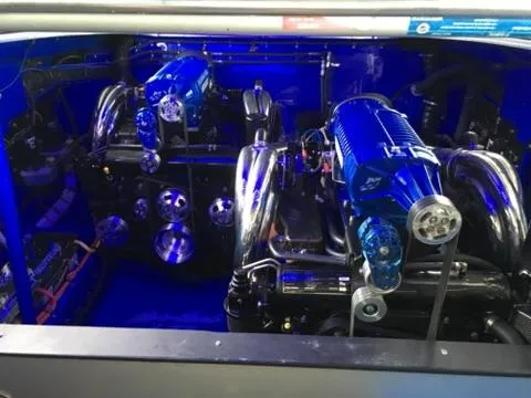 Slide: The Image of 2013 Nor-Tech 477 SPX Vee Bottom engine compartment with dual high-performance engines. - 8