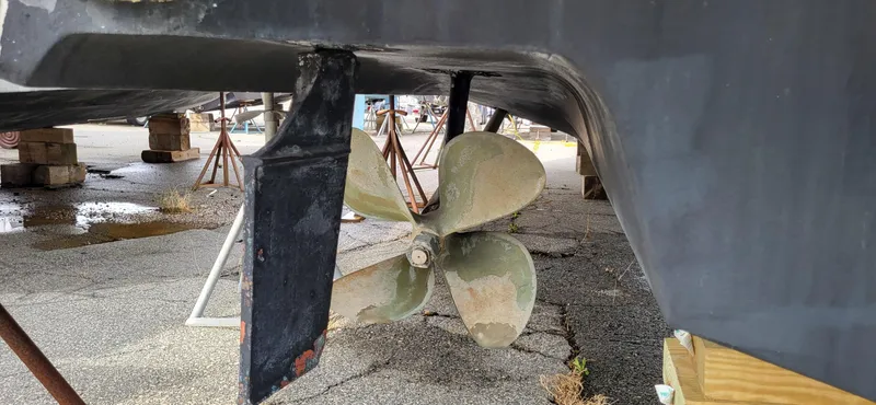 Slide: The Image of Propeller and rudder of a 2005 Sea Ray 390 Motor Yacht on dry dock. - 8