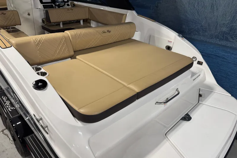 Slide: The Image of 2026 Sea Ray SDX 270 Surf boat with tan seating and sleek design. - 6