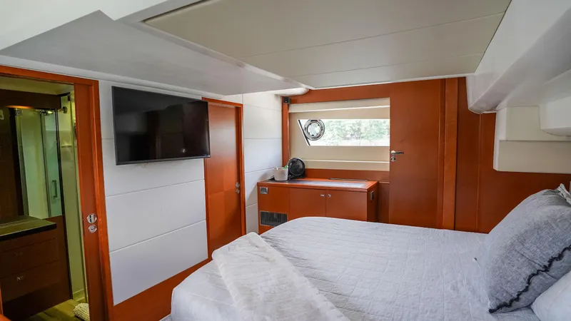 Slide: The Image of Luxurious cabin interior of 2015 Prestige 550 Flybridge yacht with modern amenities. - 32