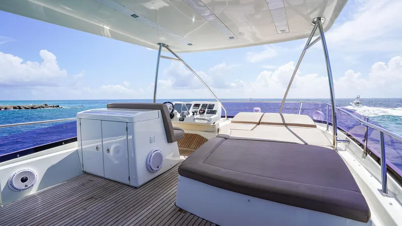 Slide: The Image of Prestige 550 Flybridge 2015 yacht with spacious deck and ocean view. - 39