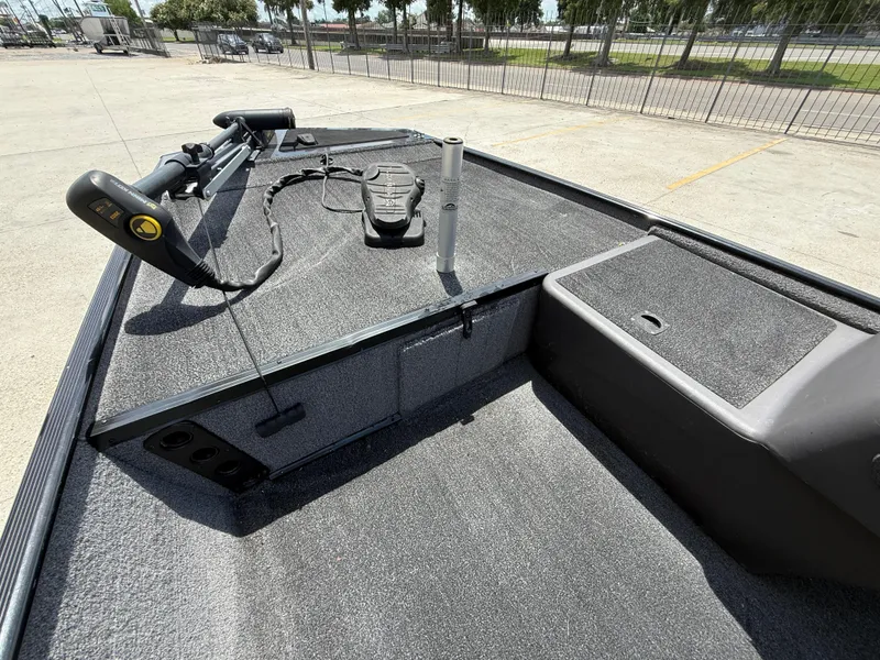 Slide: The Image of 2020 Bass Tracker Classic XL boat deck with trolling motor and pedal controls. - 9